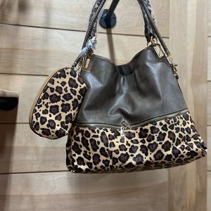 Leather like purse with matching leopard makeup bag